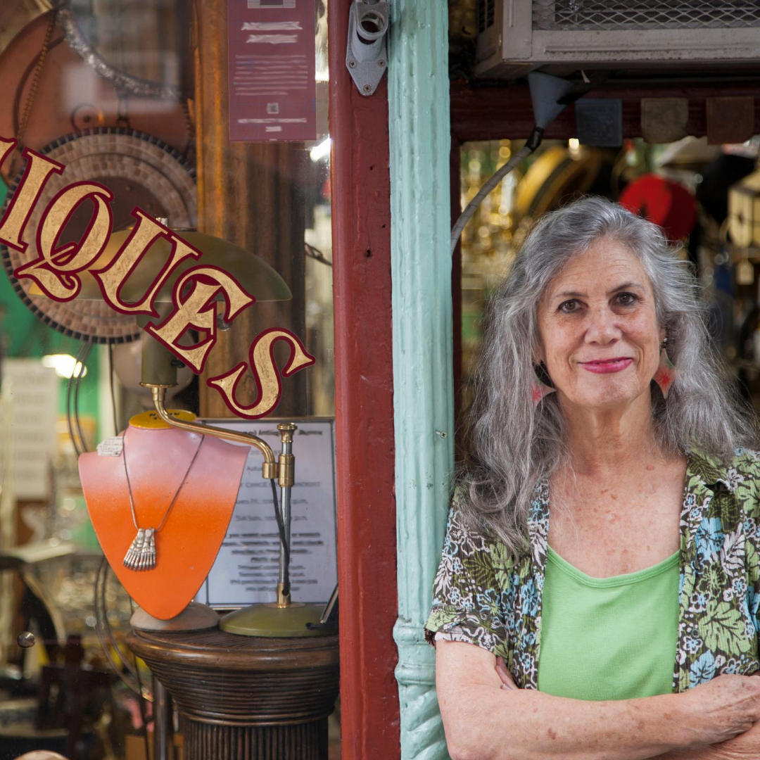Photo of women in front of a doorway