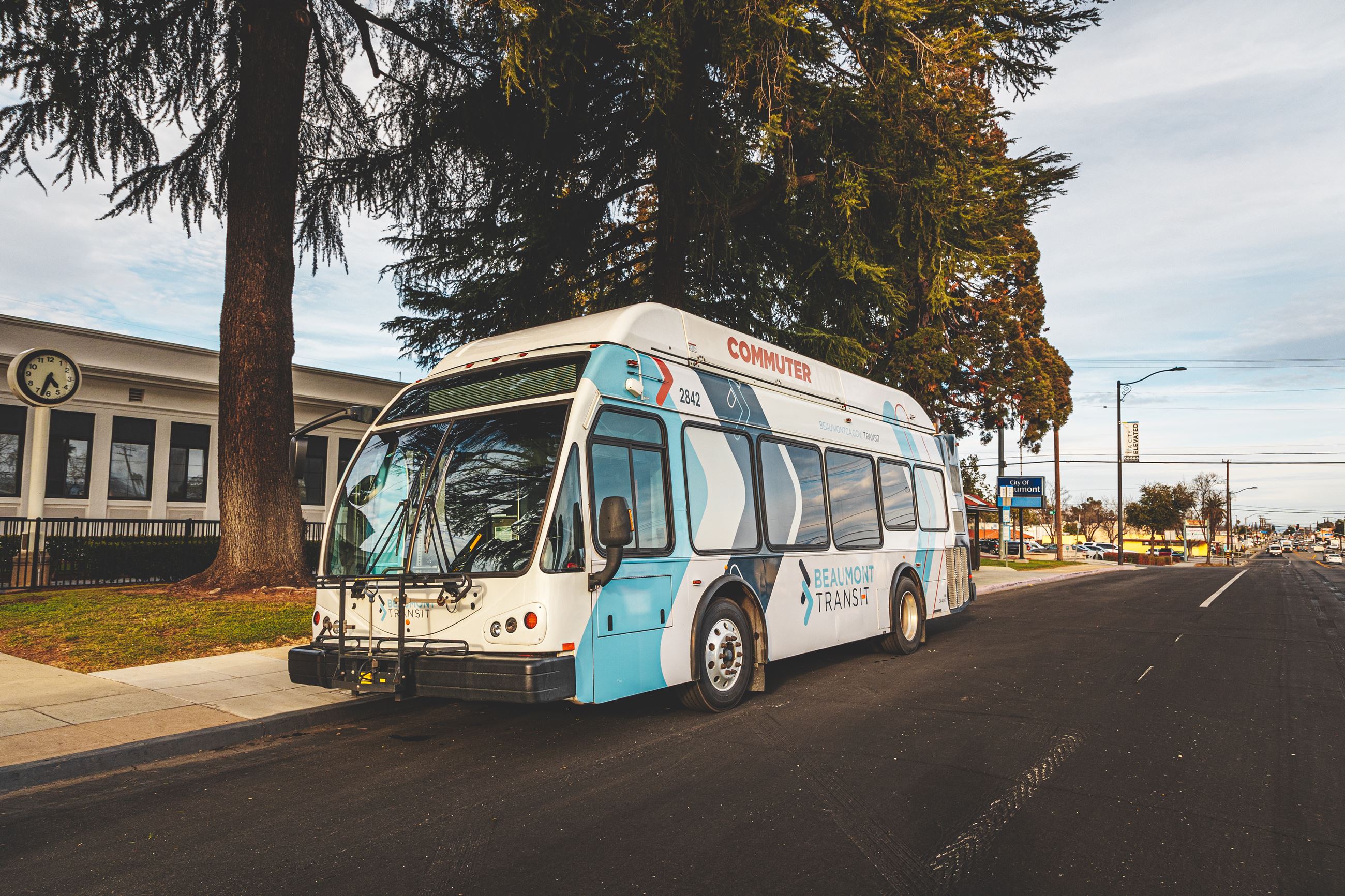 An image of a Beaumont Transit bus in front of Beaumont City Hall. 
